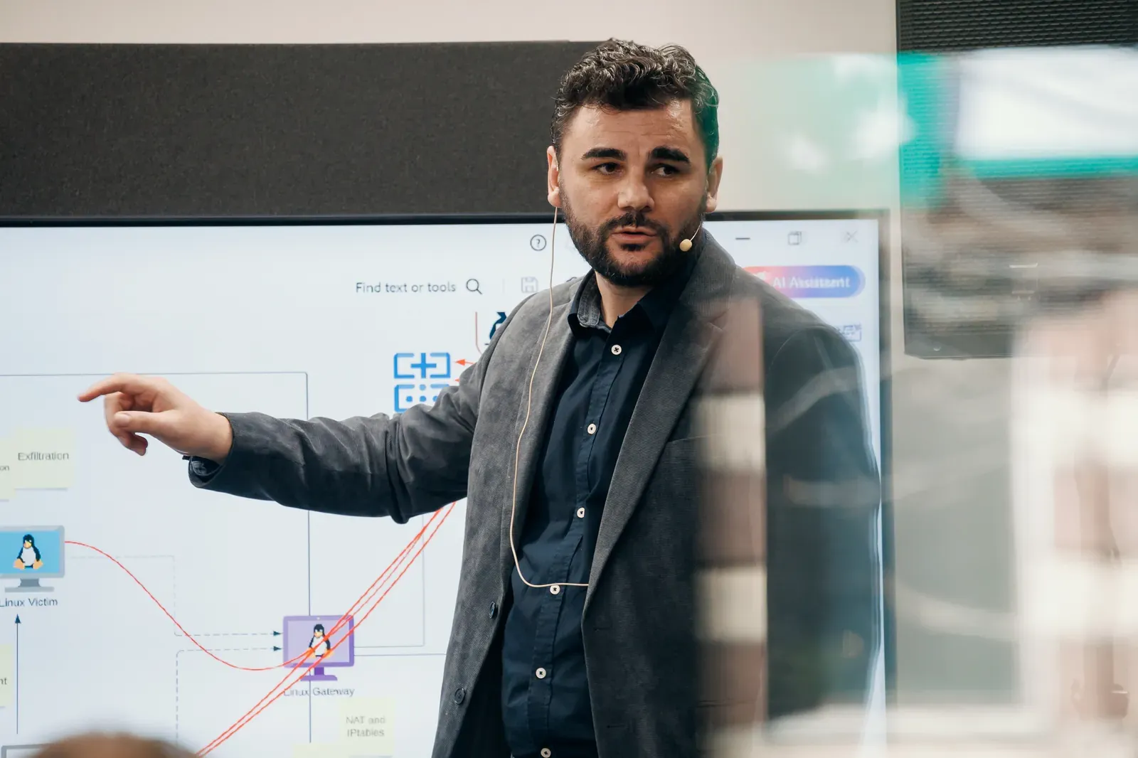 Catalin Patrascu leading a hands-on cybersecurity workshop